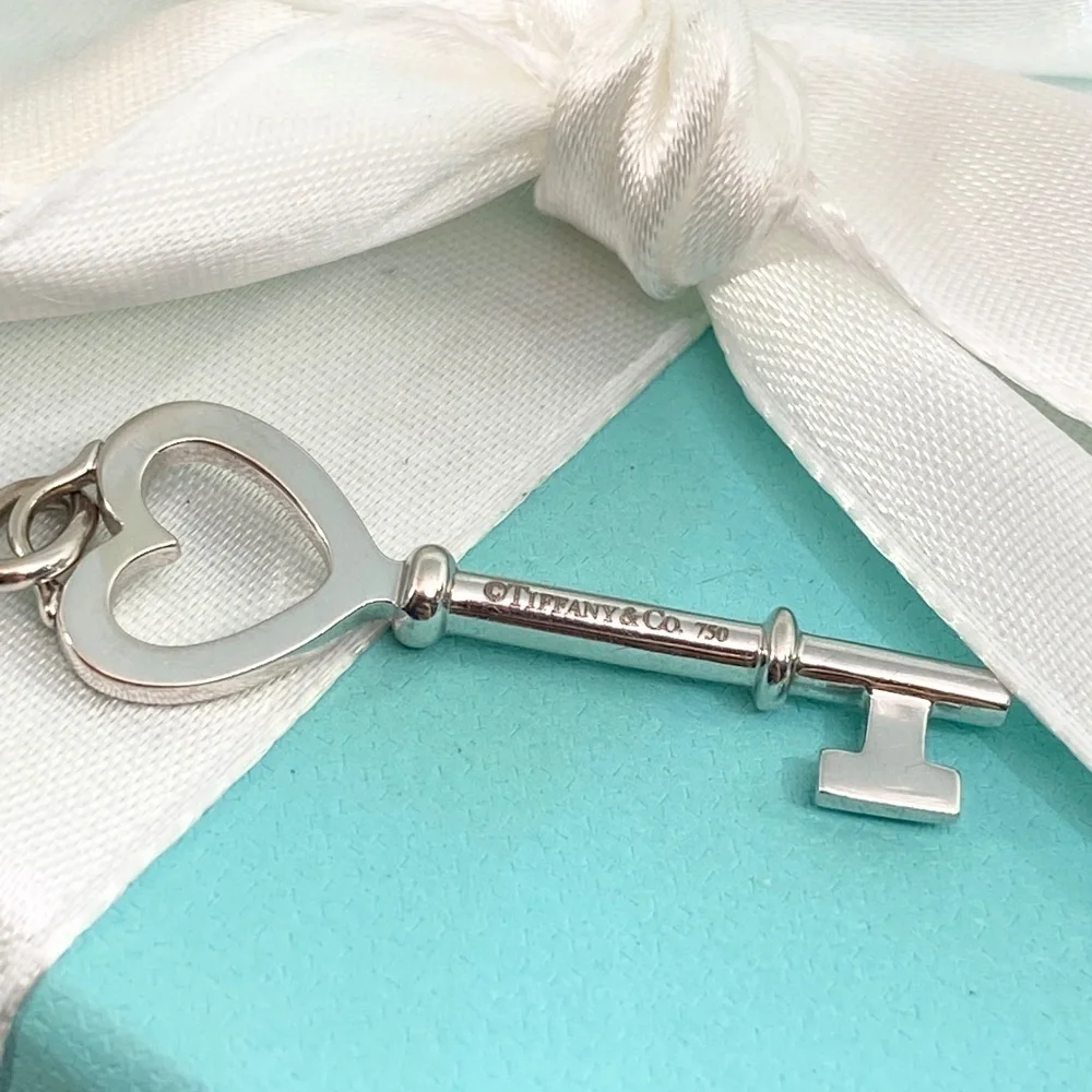 Tiffany & Co. Diamond Heart Key Charm 18kwg 1.5” – 0.10 CTW Diamonds